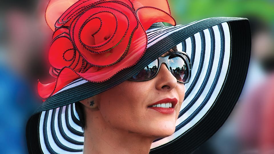 Woman wearing a derby hat