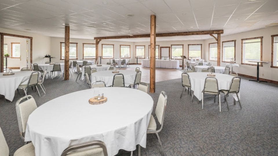 Spruce Valley event room at Shalom Park set up with round tables and decor.